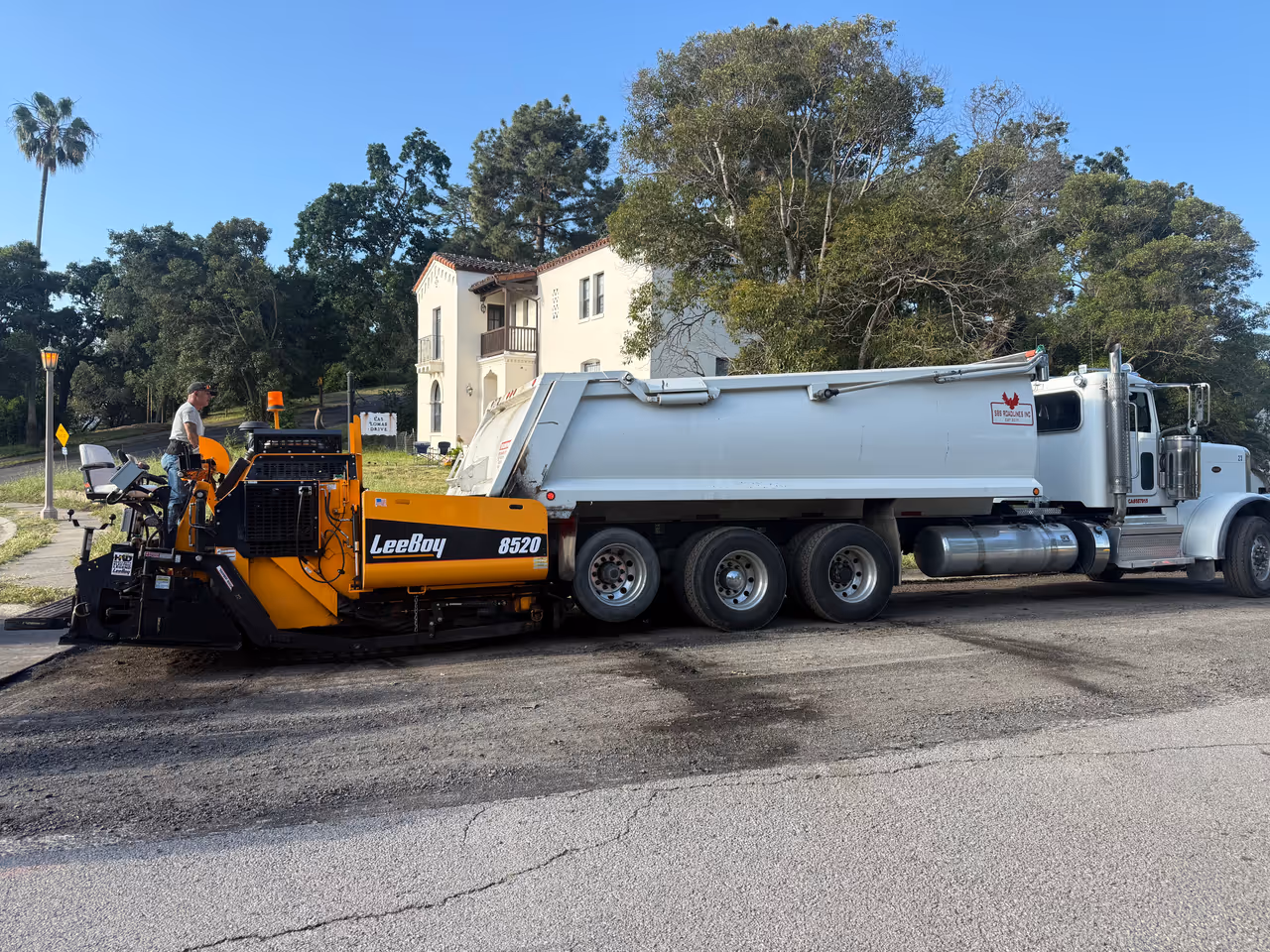 2025 LeeBoy 8520 asphalt paver and dump truck on a Sonoma County job.